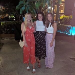 Aritzia Wilfred red jumpsuit with floral design